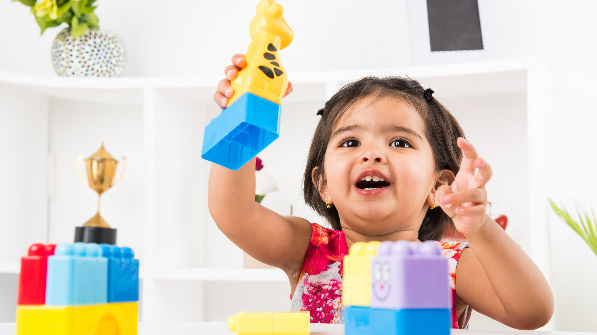 Cute,Little,Indian/asian,Girl,Enjoying,While,Playing,With,Toys,Or